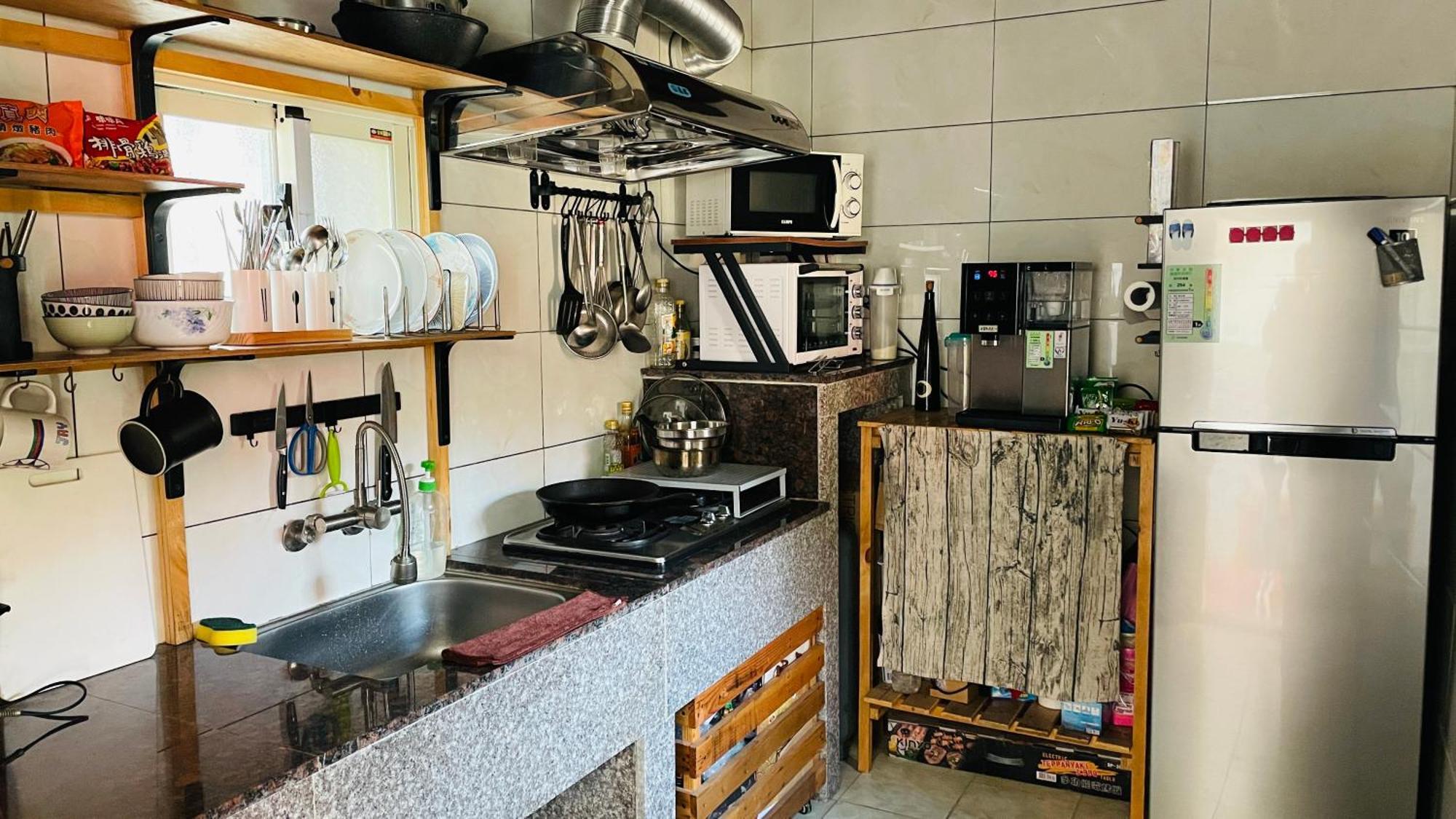 斜坡客棧 Kivala Hostel Цзиньчэн Экстерьер фото